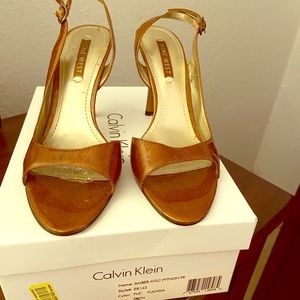 Nine West tan sandal with heels.